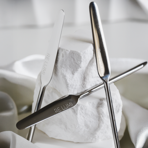 Stainless Spatulas with 'RE LUMI' branding on a white background