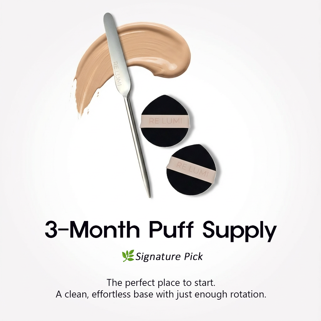 RE LUMI stainless steel spatula with two bio-based makeup puffs for a clean, eco-conscious base and steel-smooth finish.