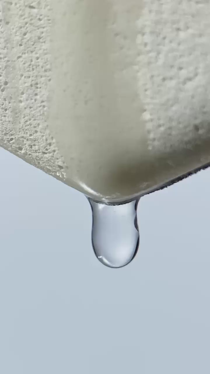 RE LUMI Base Duo video showcasing stainless steel spatula and bio-based puff for smooth, clean, sustainable foundation application.